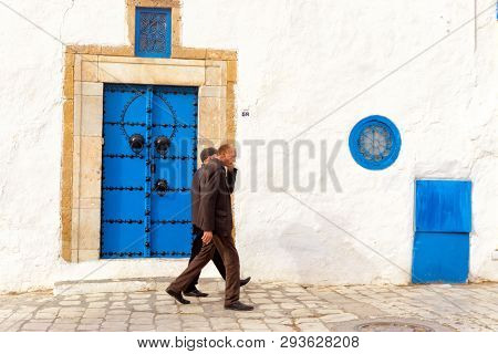 Sidi Bou Said, Tunisia- April 3: Two Men Walk In The Medina In Sidi Bou Said, Tunisia On April 3, 20