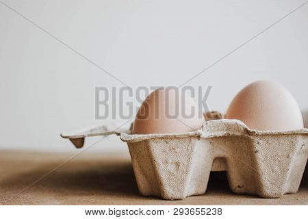 Easter Raff Egg. Minimal Easter Concept. Craft Hipster Holiday Package, Carton Box