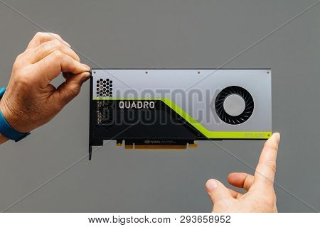 Paris, France - Mar 28 2019: Senior Man Showing Latest Nvidia Quadro Rtx 4000 Workstation Gpu With T