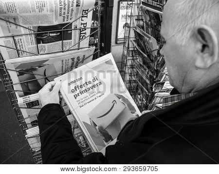 Paris, France - 29 Mar 2019: Newspaper Stand Kiosk Selling Press With Senior Male Hand Buying Latest