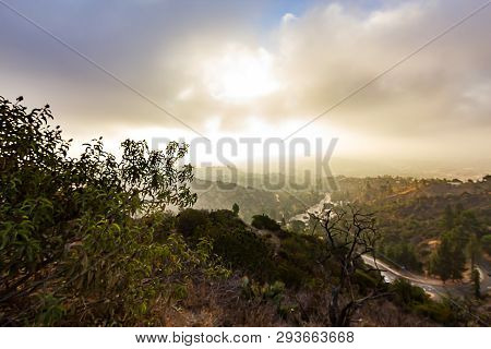 Hilside View Of Surrounding Hills And Street