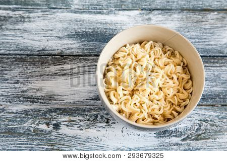 Instant Noodles On Wooden Background. Cooked Chinese Instant Noodles. Soup Ramen