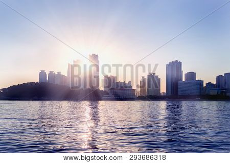 View On Haeundae Beach, Sunset And Skyscrappers At Busan From The Sea
