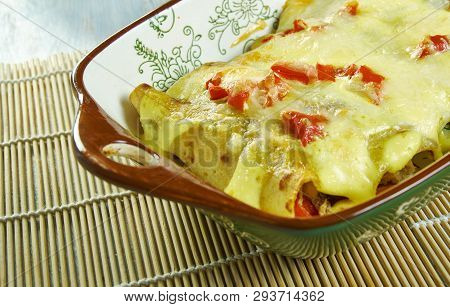 Creamy Pepperjack Chicken Enchiladas