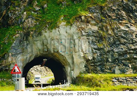 Road With Old Tunnel In Green Summer Mountains, Norway. National Tourist Andoya Route.