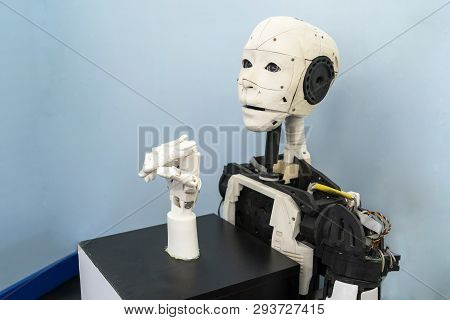 Chelyabinsk. Russia - February 24, 2019.stand For The Manufacture Of Robots, A Robot With A Human Fa