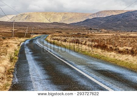 Conemara Road With Bog And Mountains In Background