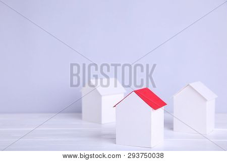 Paper Town. Papercraft House And Papercraft Building On Grey Background