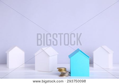 Paper Town. Papercraft House And Papercraft Building On Blue Background