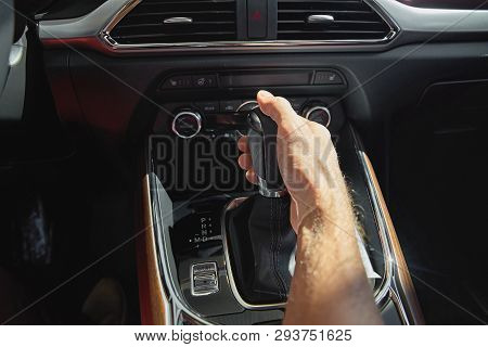 Men Handle Hold To Gear Stick Lever, Start Driving Vehicles.on A Hot Day.