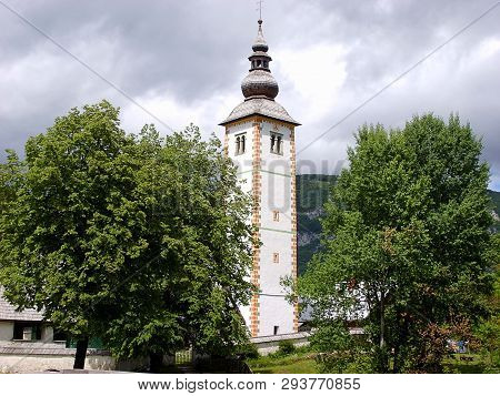 Church Of Sv. John The Baptist And A Bridge By The Bohinj Lake