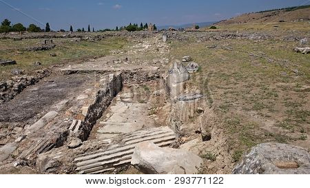Sunny View Of Ancient Ruins Of Ancient Hierapolis Near Pamukkale, Denizli Province, Turkey.