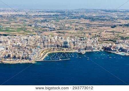 Aerial View Of Bugibba Town, St. Paul's Bay In The Northern Region, Malta. Popular Tourist Resort De