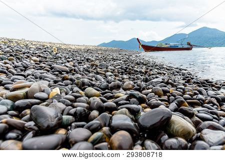 Beautiful Nature Landscape Of Rock With Unusual Black Color And Long Tail Boat Trip Floating In The 