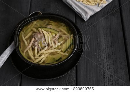 Dark Photo Of Homemade Pasta Trofie From Liguria . Italian Healthy Food Concept With Copy Space. Sou