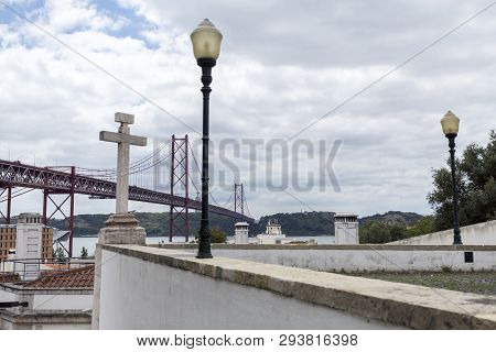View Of The 25th Of April Suspension Bridge Crossing The Tagus River Seen From The Belvedere Of Sain
