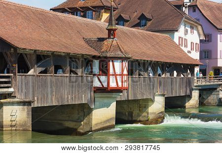 Bremgarten, Switzerland - June 16, 2018: Medieval Covered Bridge Over The Reuss River (german: Reuss