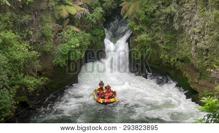 Rotorua, New Zealand- December, 2 2015: A Group Of Thrill Seekers Whitewater Rafting The Kaituna Riv