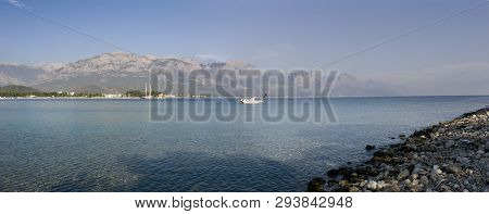 Kemer Antalia Nice View Of The Sea. Beach Kemer Antalia With Sand And Mountains, The Sea With The Sh