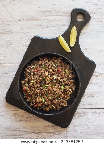 Indian Minced Meat Qeema On A White Wooden Table. Top View.