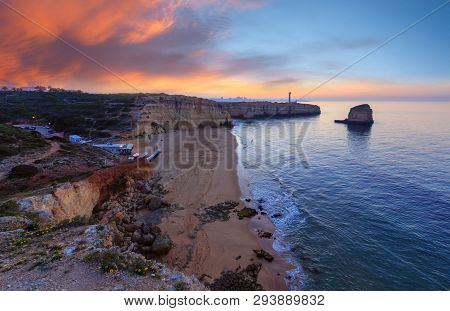 Sea Coast Sunset View With Lighthouse Of Ponta Do Altar. West View Over Praia Da Afurada Beach (ferr