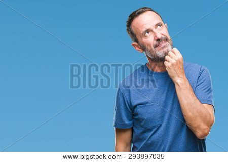 Middle age hoary senior man over isolated background with hand on chin thinking about question, pensive expression. Smiling with thoughtful face. Doubt concept.