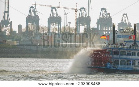 Hamburg, Germany - March 30, 2019: Louisiana Star Rear-wheel Steamer Passenger Ship Hoists The Elbe 