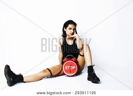 Young Pretty Indian Girl With Red Alarm Clock Posing Cheerful On White Background Isolated, Sexy Mod