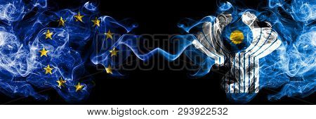 European Union Vs Commonwealth Smoke Flags Placed Side By Side. Thick Colored Silky Smoke Flags Of E