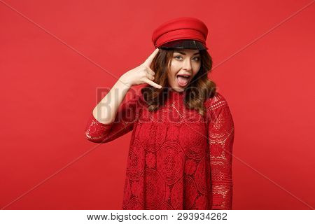 Portrait Of Pretty Young Woman In Lace Dress And Cap Doing Phone Gesture Like Says Call Me Back Isol