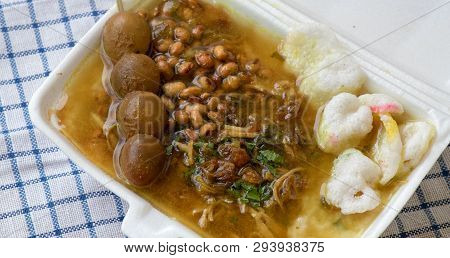 Bubur Ayam Is A Porridge Mixed With Chicken Meat Served With Egg And Vegetables - Image