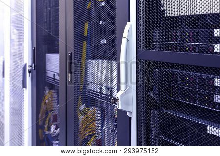 Row Of Racks In Big Data Center Inside Close Up. Datacentre Interface And Equipment.