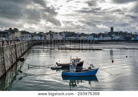 This Is Donaghadee Harbour And Lighthouse On The East Coast Of Northern Ireland.  Fishing Boats Are 