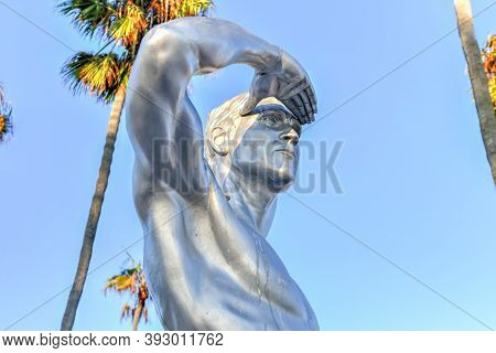 Newport Beach, California - July 25, 2020: The Ben Carlson Memorial Statue, A 9-foot-tall Stainless-