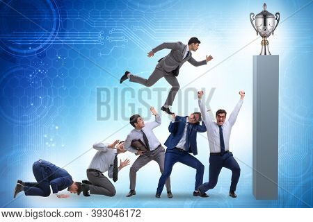 Career progression concept with businessman climbing stairs