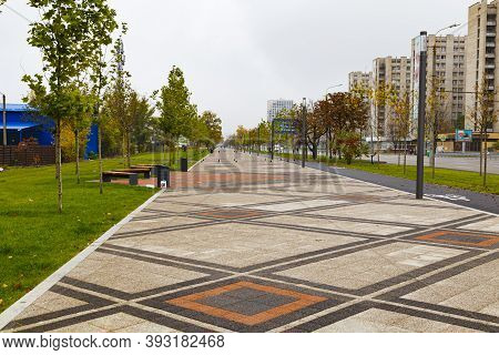 Empty City Pedestrian Embankment At Autumn. Dnipro City, Ukraine. Modern Urban Landscape, Town Plann