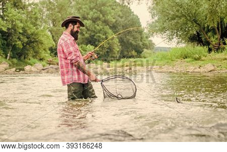 Gone Fishing. Bearded Fisher In Water. Hobby And Sport Activity. Pothunter. Summer Weekend. Big Game