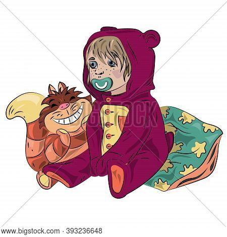 A Small Child With A Pacifier In His Mouth Sits On A Pillow With A Toy. Cheshire Cat Toy. Childrens 