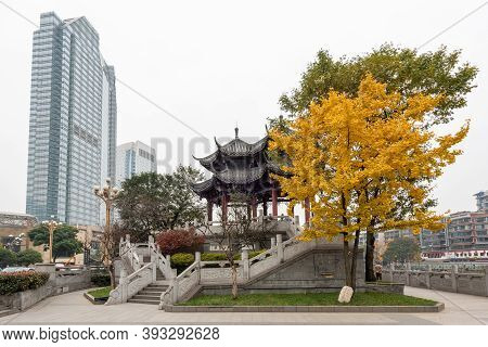 Chengdu, Sichuan Province, China - December 7, 2019 : Hejiang Chinese Pavillion And Gingko Tree With