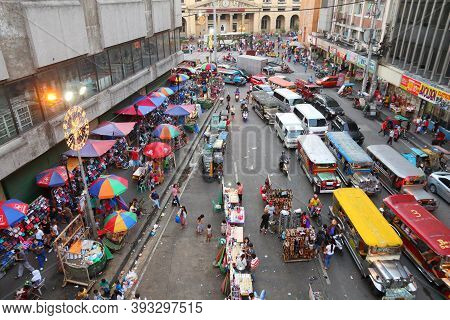 Manila, Philippines - November 25, 2017: People Drive In Heavy Traffic In Manila City, Philippines. 
