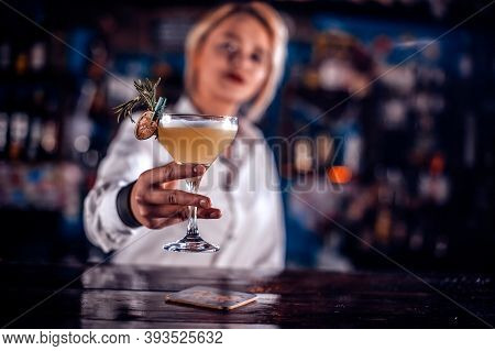 Girl Bartender Creates A Cocktail On The Porterhouse