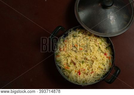 Homemade And Healthy Shavige Upittu On A Brown Background