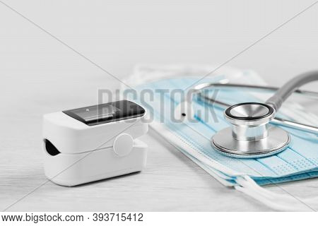 Medical Concept. Pulse Oximeter, Stethoscope And Face Masks. Pneumonia Prevention And Cure, Flu Sesi