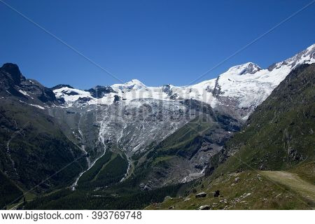 Glacier In Saas Fee, Seen From A Hill