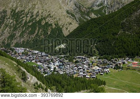 Village Of Saas Fee Seen From A Hil