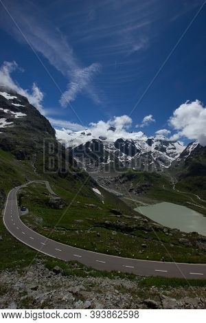 Street And Lake At The Alpine Pass Susten