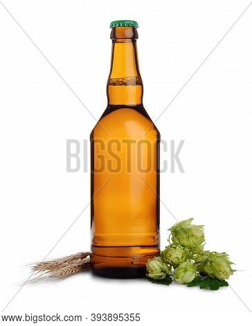 Glass Bottle Of Fresh Beer With Green Hop Cones And Wheat Ears Isolated On White Background.