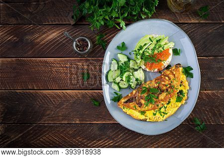 Omelette With Forest Mushroom, Fusilli Pasta And Sandwich Wich Red Cavier, Avocado On Plate.  Fritta