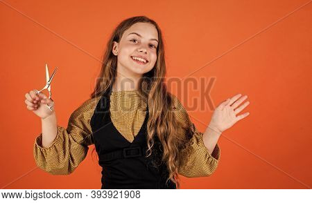 Child With Scissors Wants To Cut Hair. Girl In Hairdressing Salon. Teenager Cutting Hair. Cute Girl 