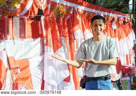 Portrait Of A Young Man Selling Flags
